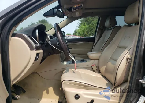 2014 Jeep Grand Cherokee Overland из США, поврежденный, VIN 1C4RJFCT0EC492371